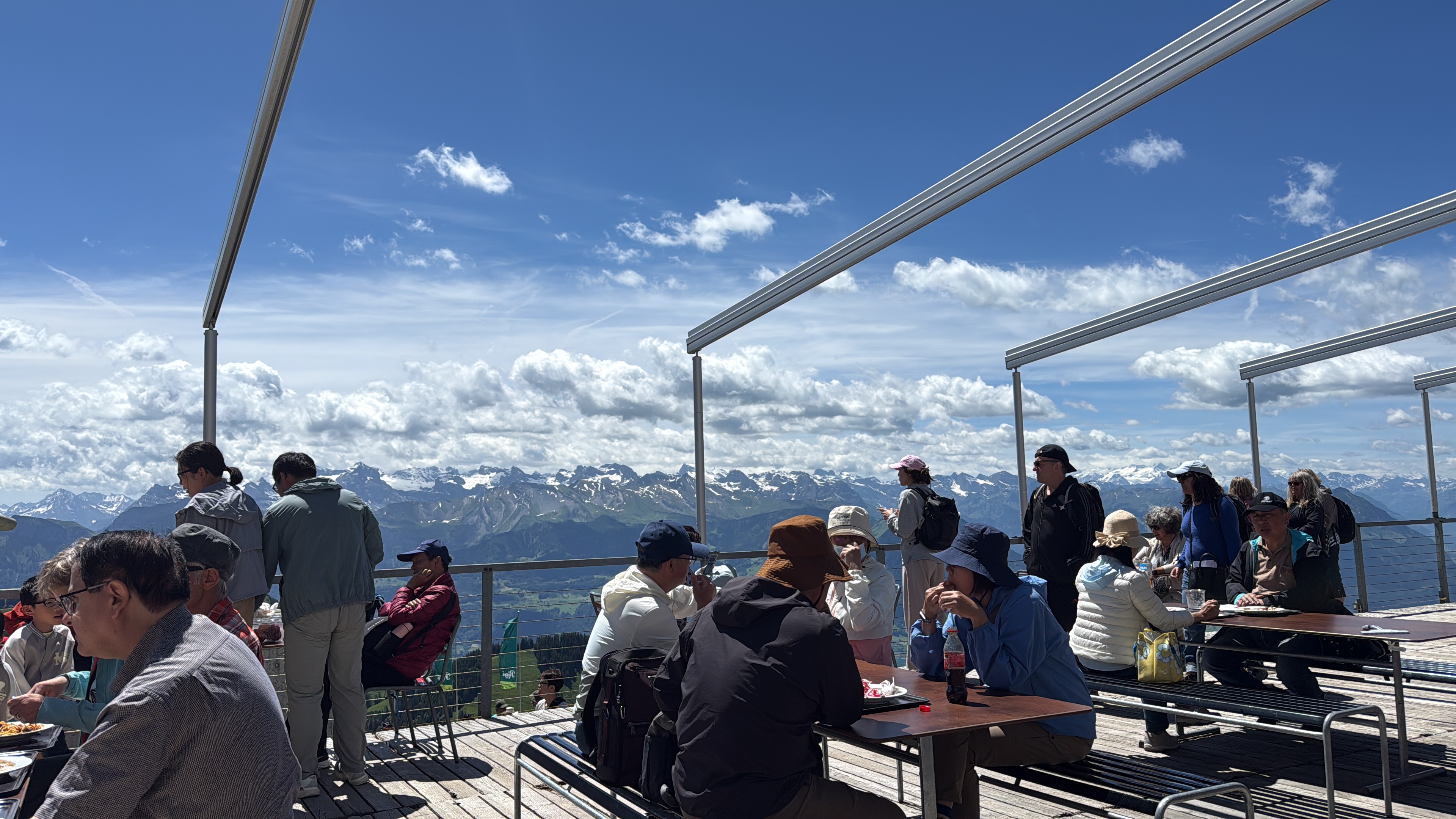 Lunch on the terrace with snowy Alps stretching to the horizon.